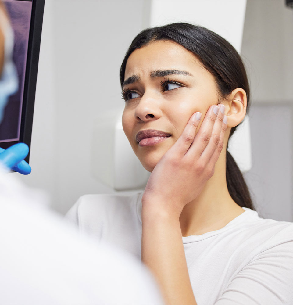 Toothache, dentist and woman in pain, clinic and consultation for dental health of patient in office.