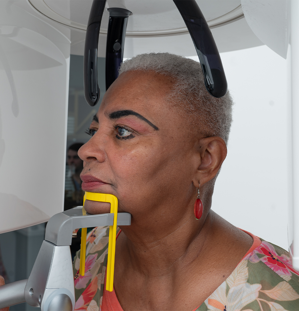 patient undergoing cbcst scan for their dental treatment