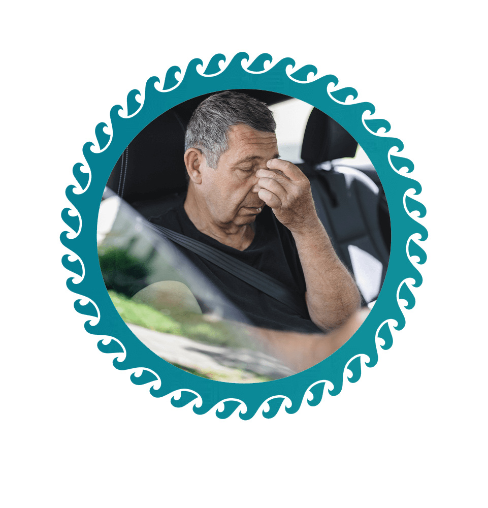 Tired pensioner dring in a car