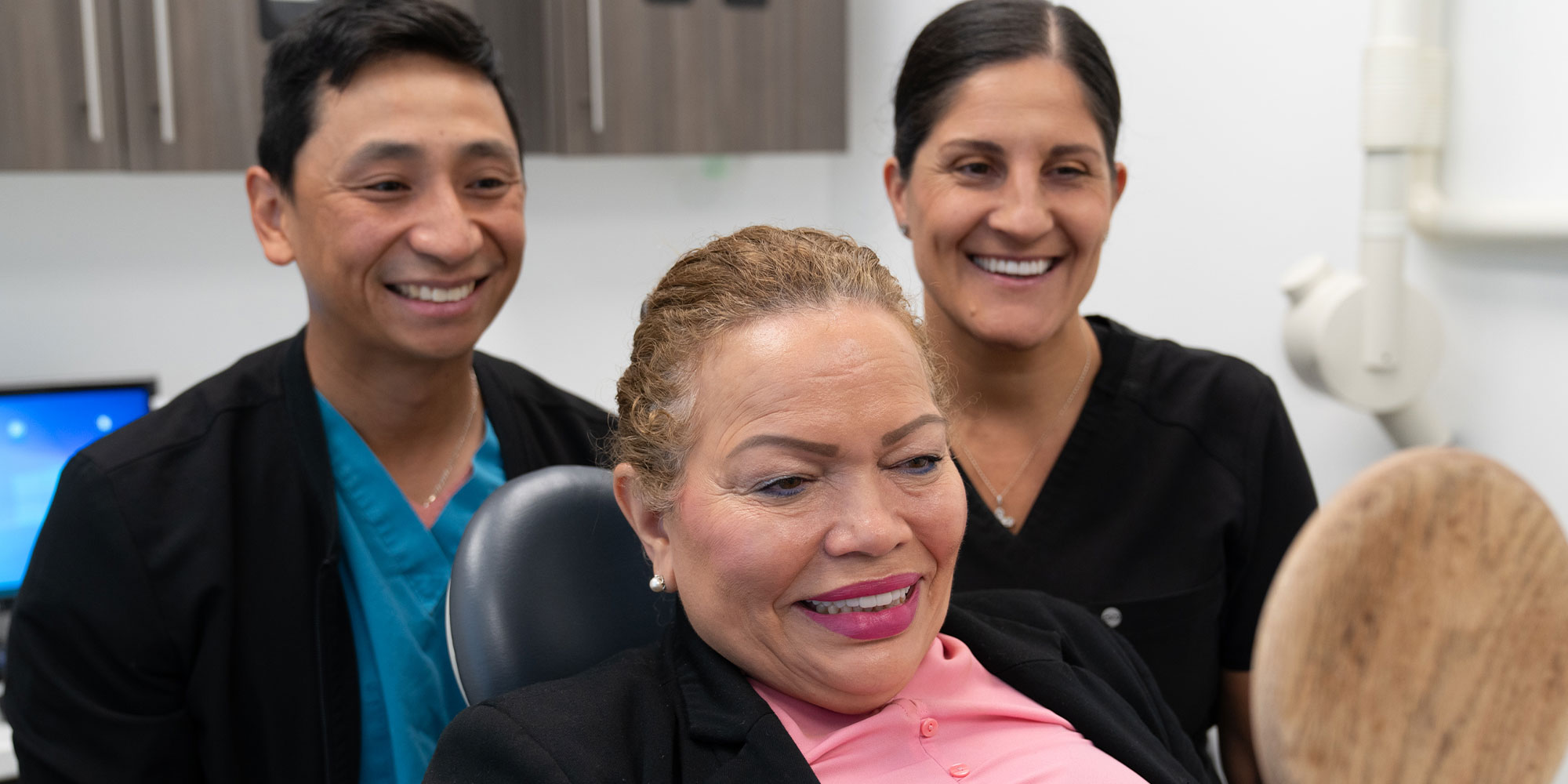 Doctor and Patient looking into mirror