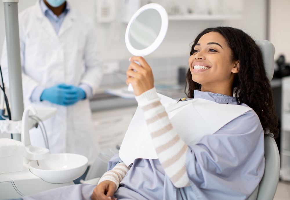 Dentist consulting a patient in a modern dental clinic setting