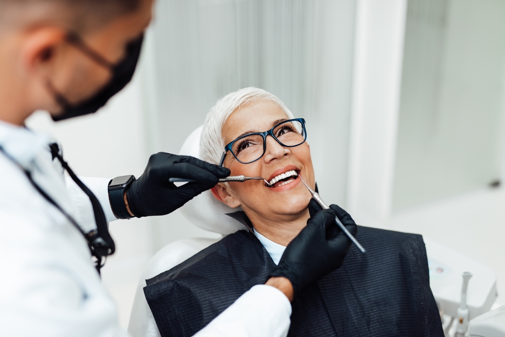 Dentist consulting with a patient about dental restoration options